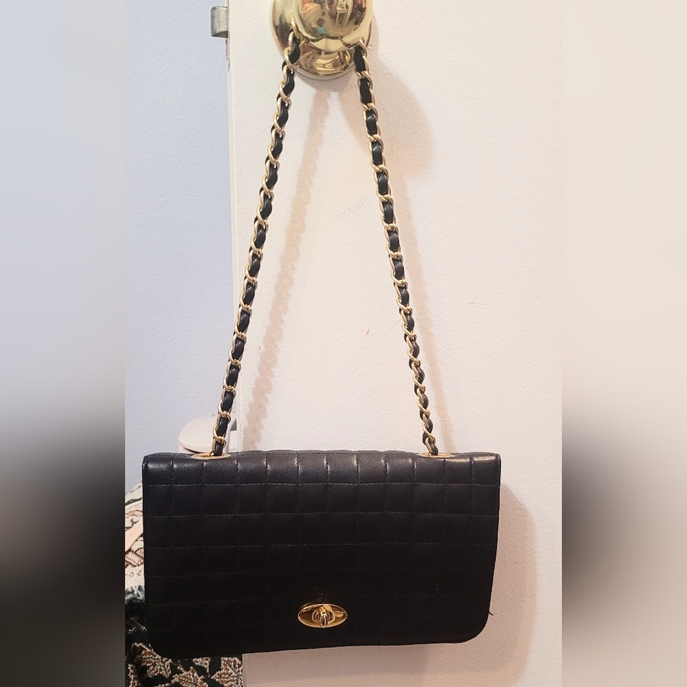 Black shoulder party bag with small mirror inside. Pre-loved, in good condition.
